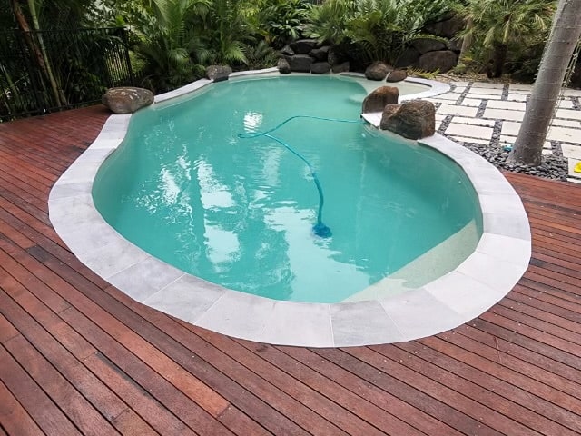 new pool with a timber deck